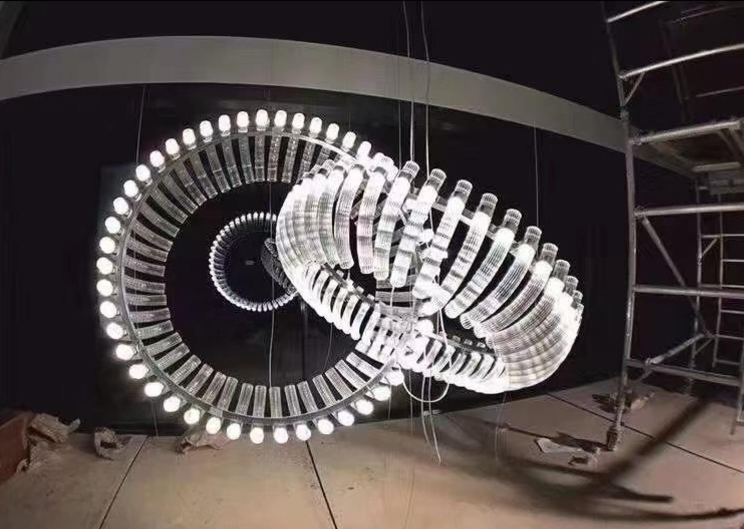 Large circular strip chandelier in sales center